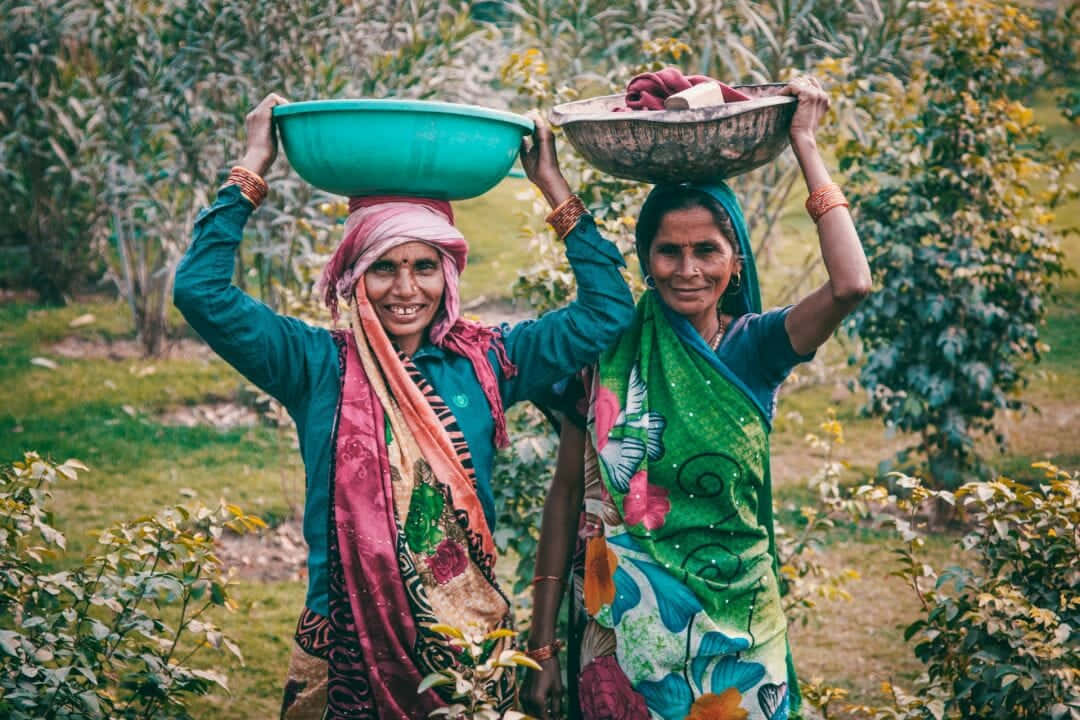 Indian Women With Basin Background