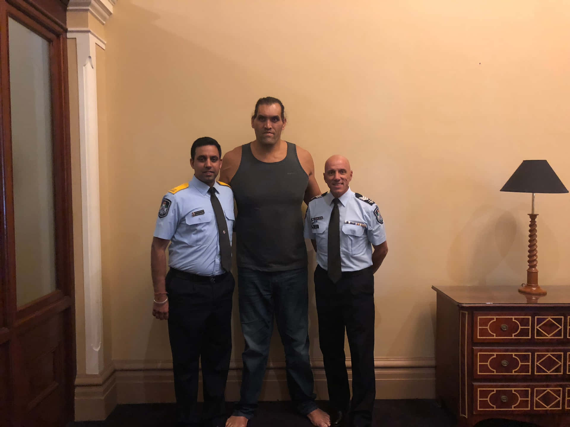 Indian Wrestler The Great Khali With Queensland Police Service Background