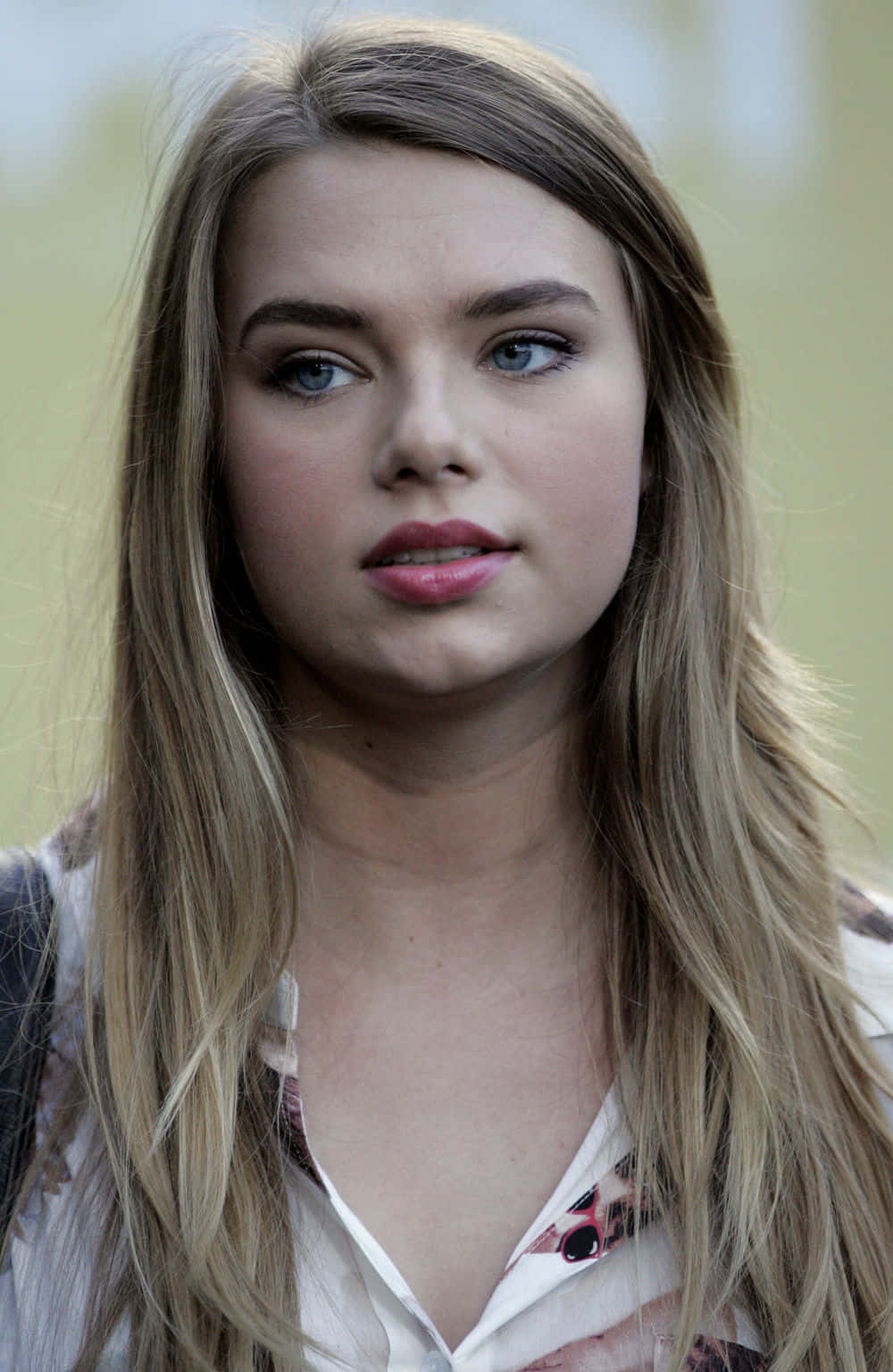 Indiana Evans, A Radiant Beauty In A Mesmerizing Pose. Background