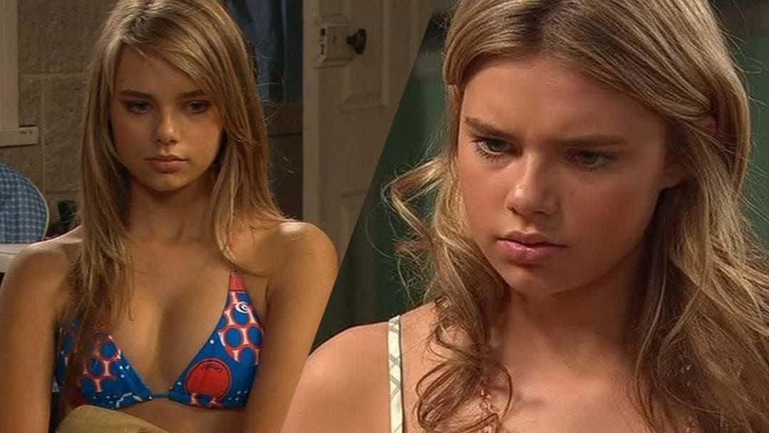 Indiana Evans Blue Bikiniand Intense Look Background