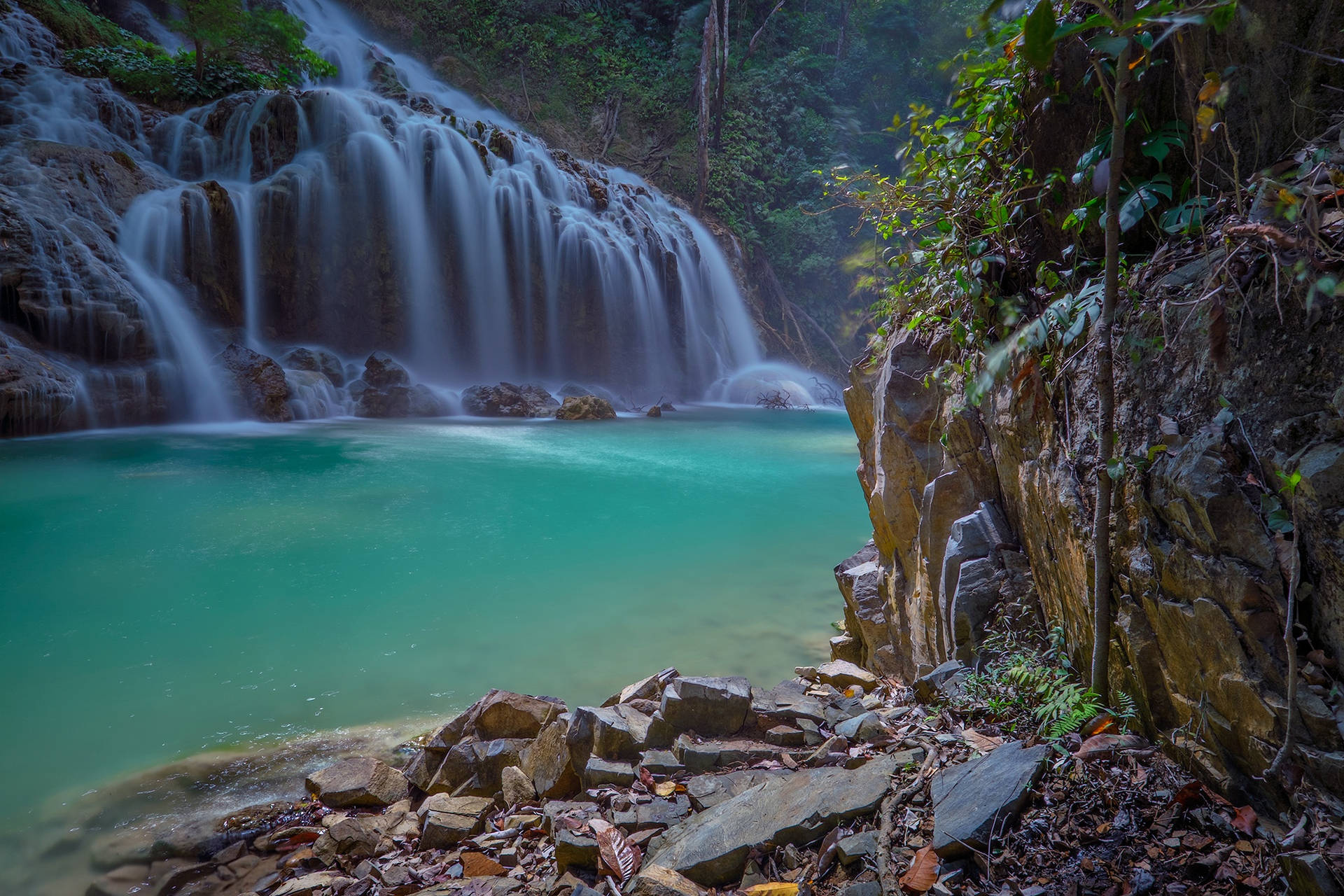 Indonesia Waterfalls Along River Background