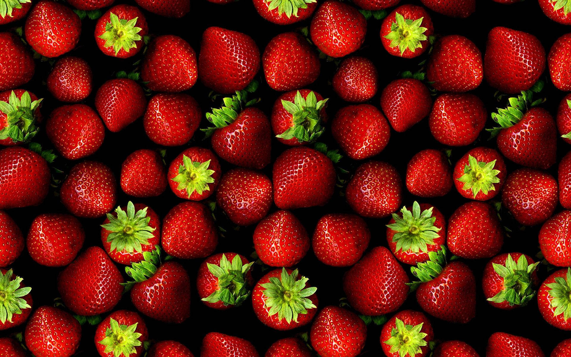 Indulge In The Sweetness Of Stawberries Background