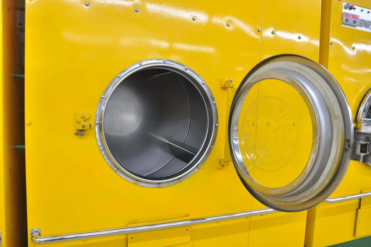 Industrial Yellow Washing Machine Background