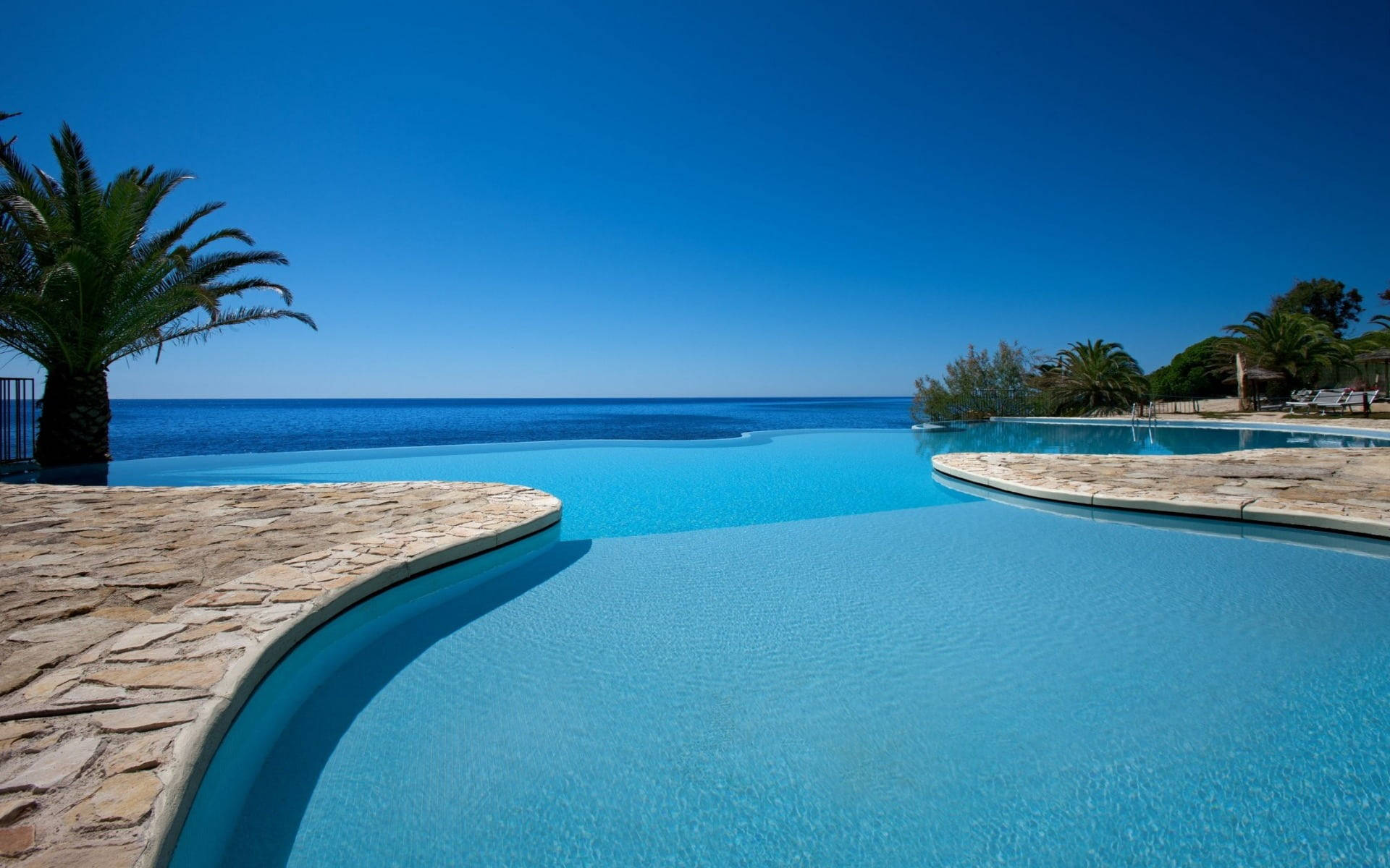 Infinity Pool By The Beach Tropical Desktop Background