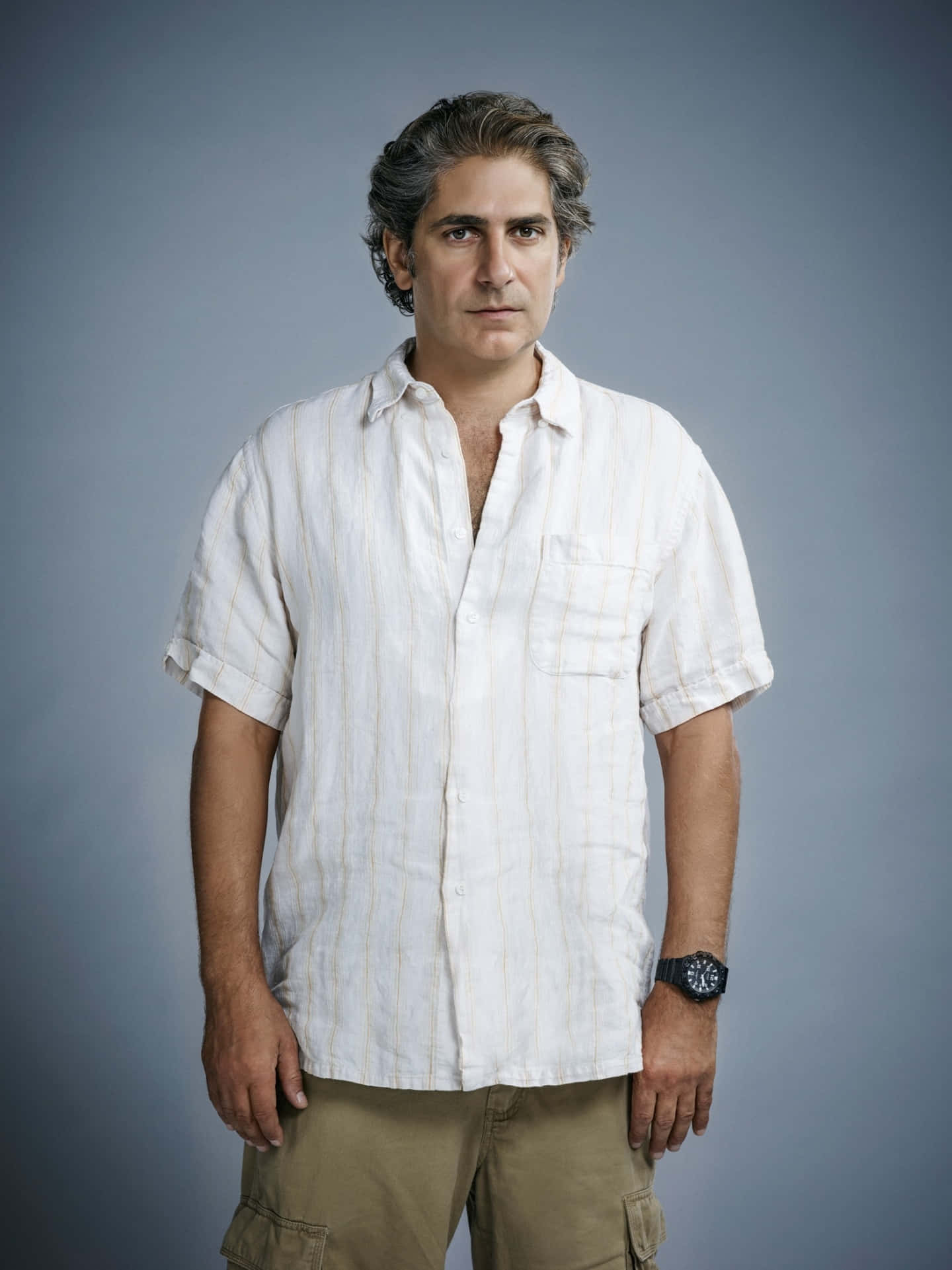 Influential Actor Michael Imperioli In A Thoughtful Pose. Background