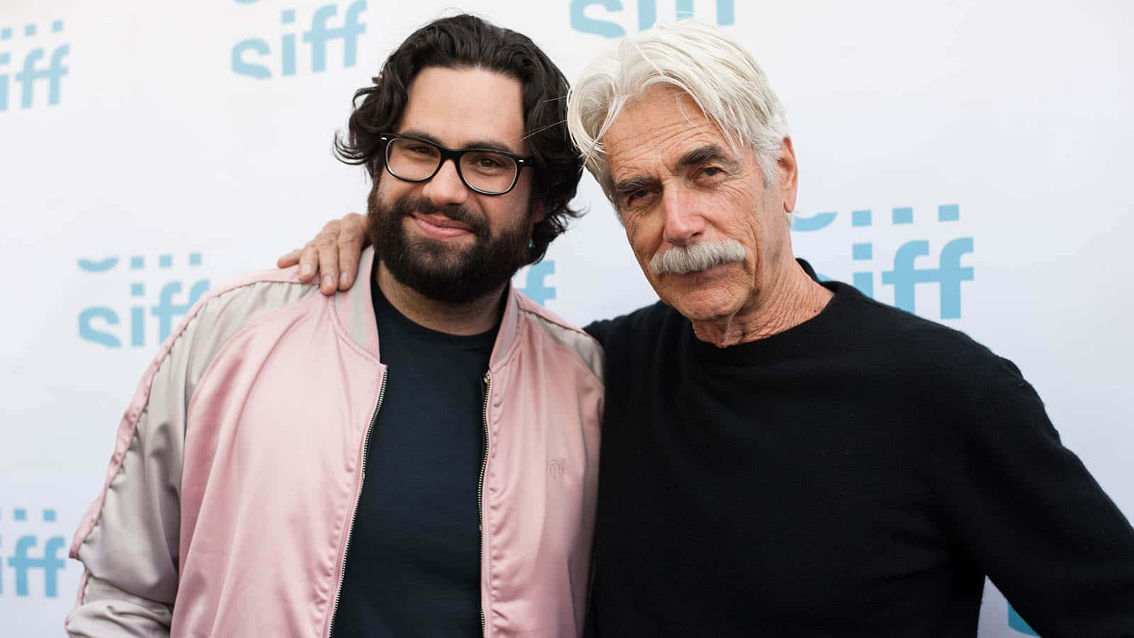 Influential American Actor Sam Elliott In A Reflective Moment Background