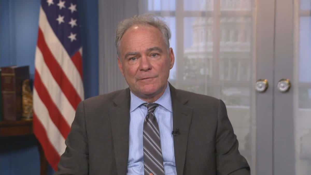 Influential Figure, Tim Kaine, In A Professional Gray Suit Background