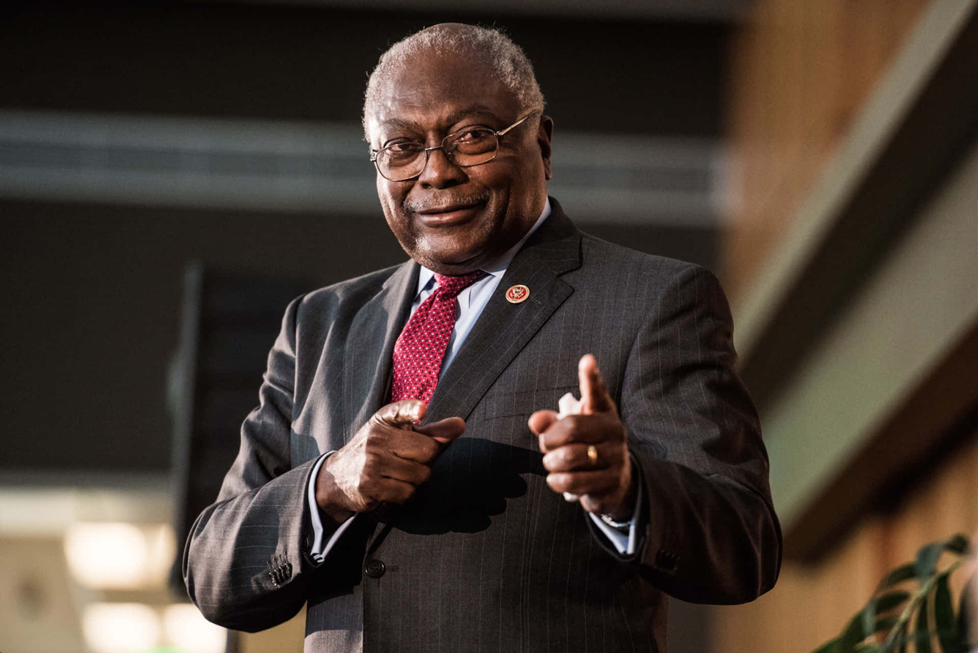 Influential Politician Jim Clyburn Pointing During A Speech. Background