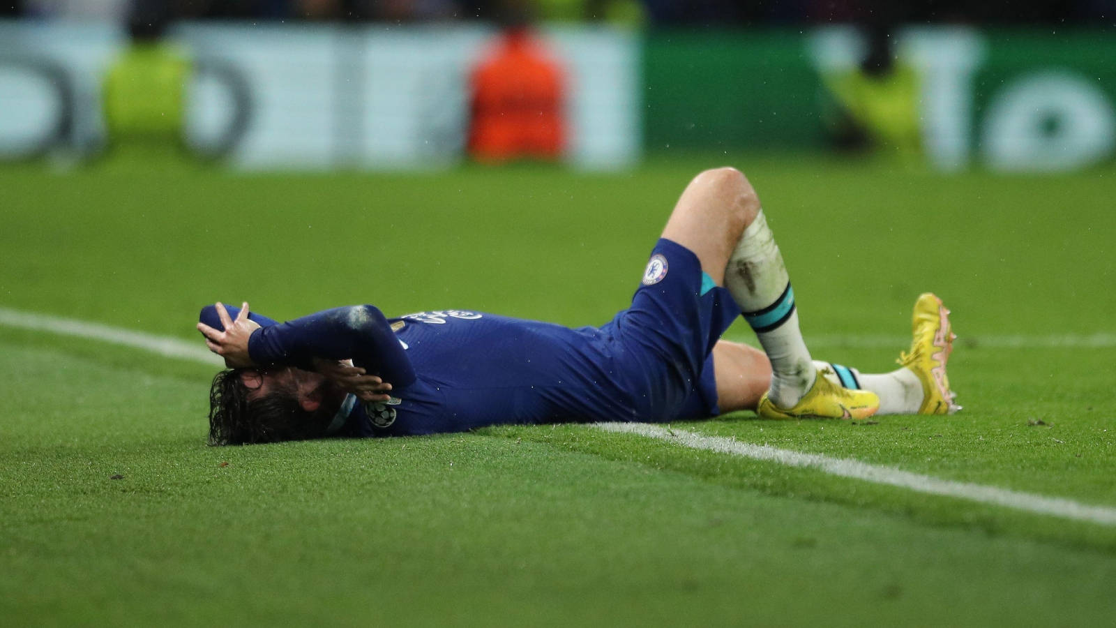 Injured Ben Chilwell Lying Down Background