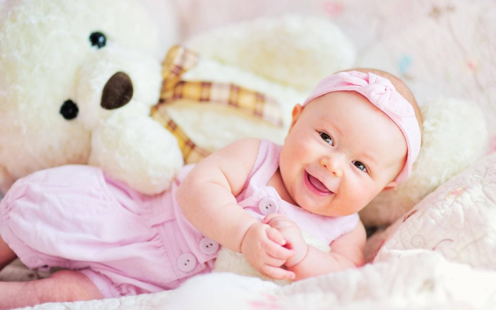 Innocence Personified: Newborn Baby Nestled Comfortably Background