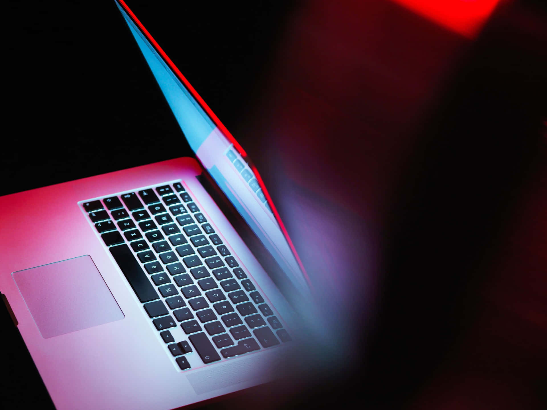 Inscrutable Laptop With Hidden Screen Background