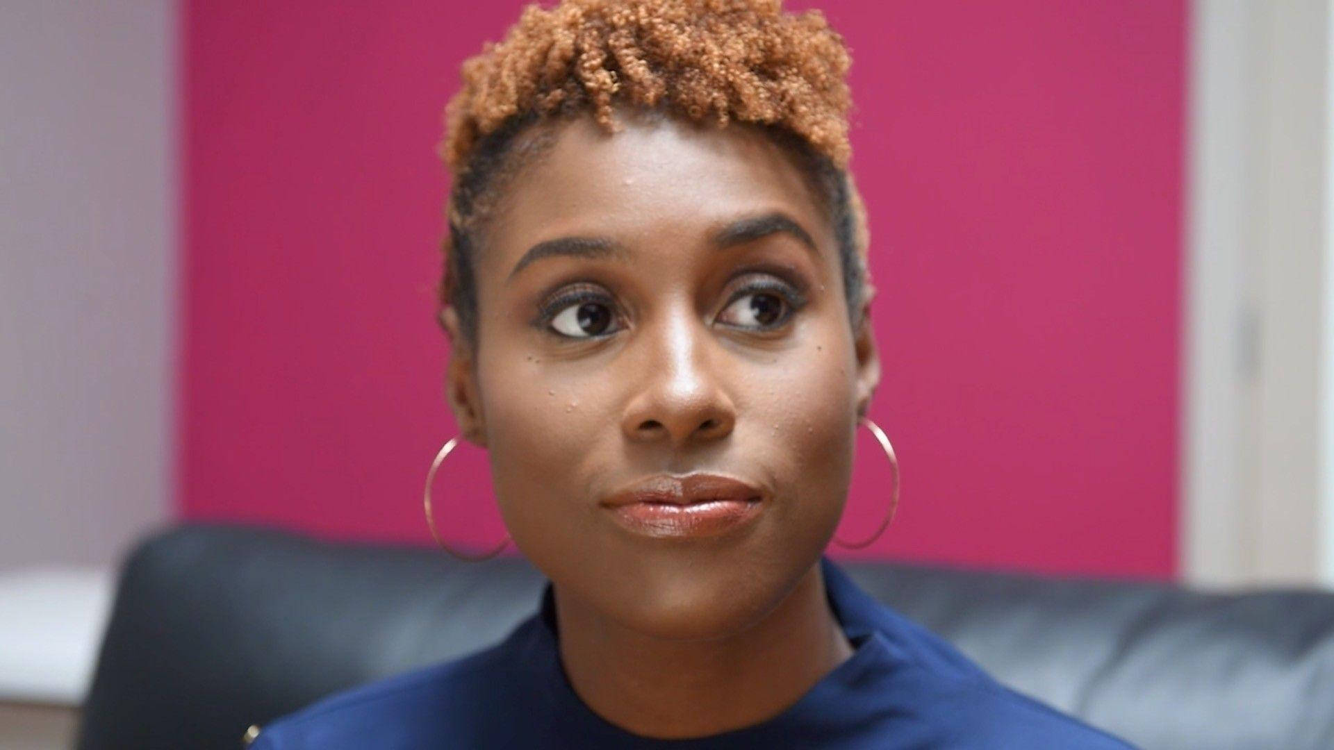 Insecure Creator Issa Rae Sitting Background