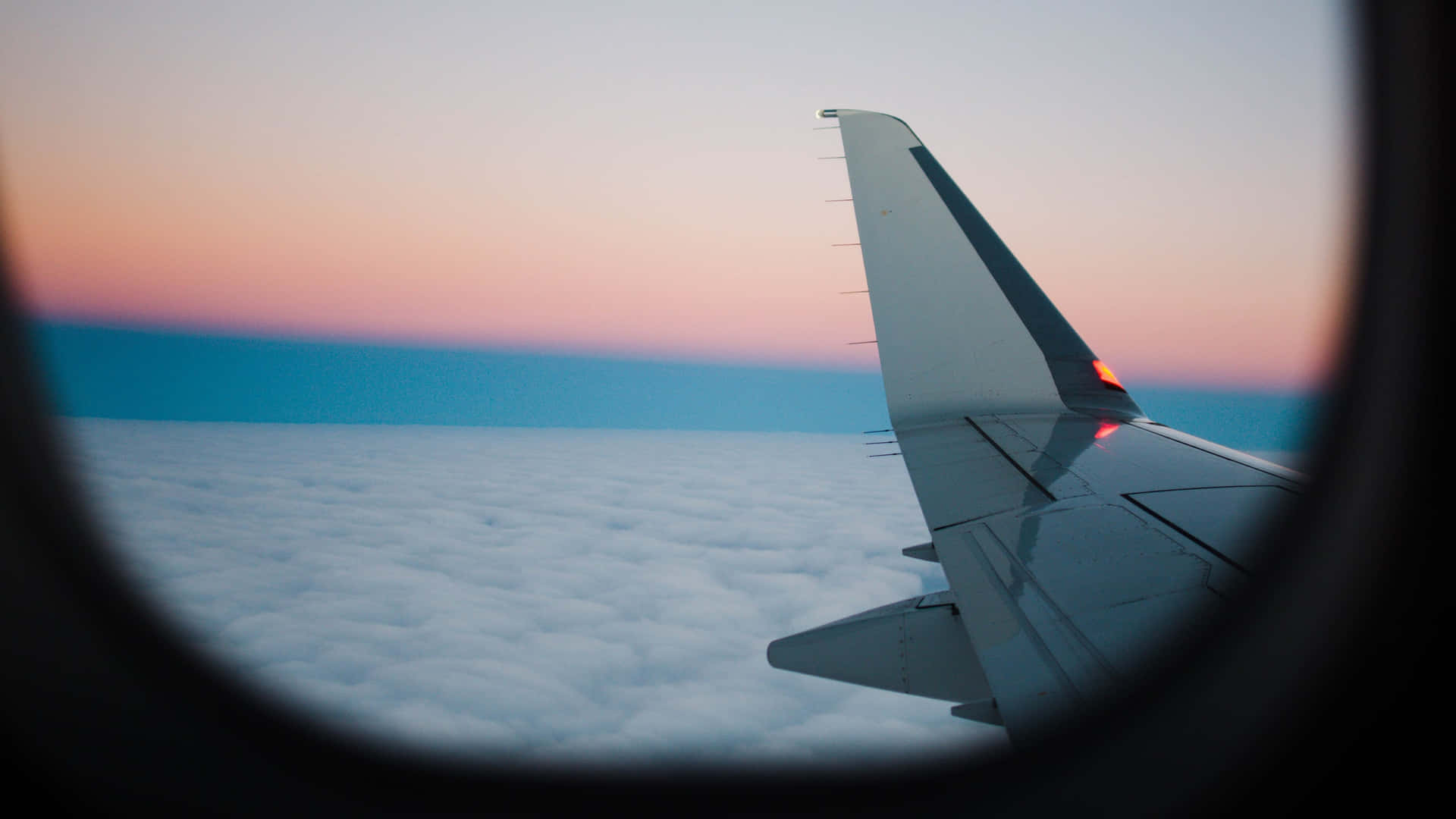 Inside Airplane Overlooking Aircraft Wing Background