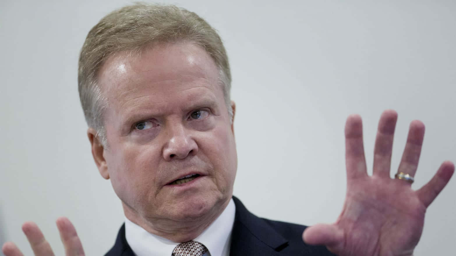 Insightful Close-up Portrait Of Jim Webb Background