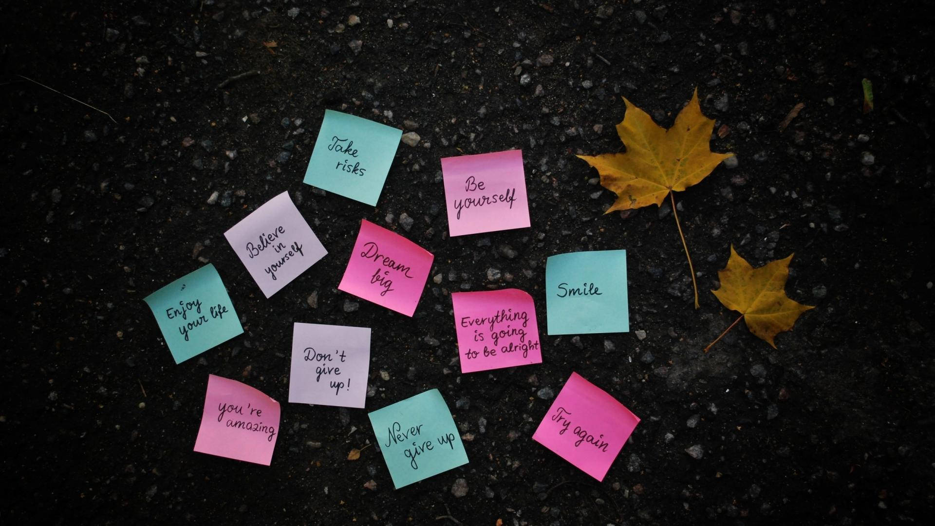 Inspiring Life Quotes On Sticky Notes Background