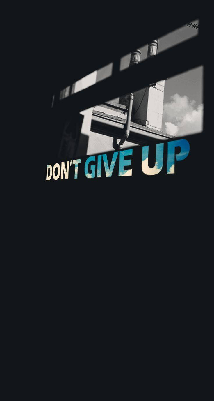 Inspiring Sky View With 'never Give Up' Message Background