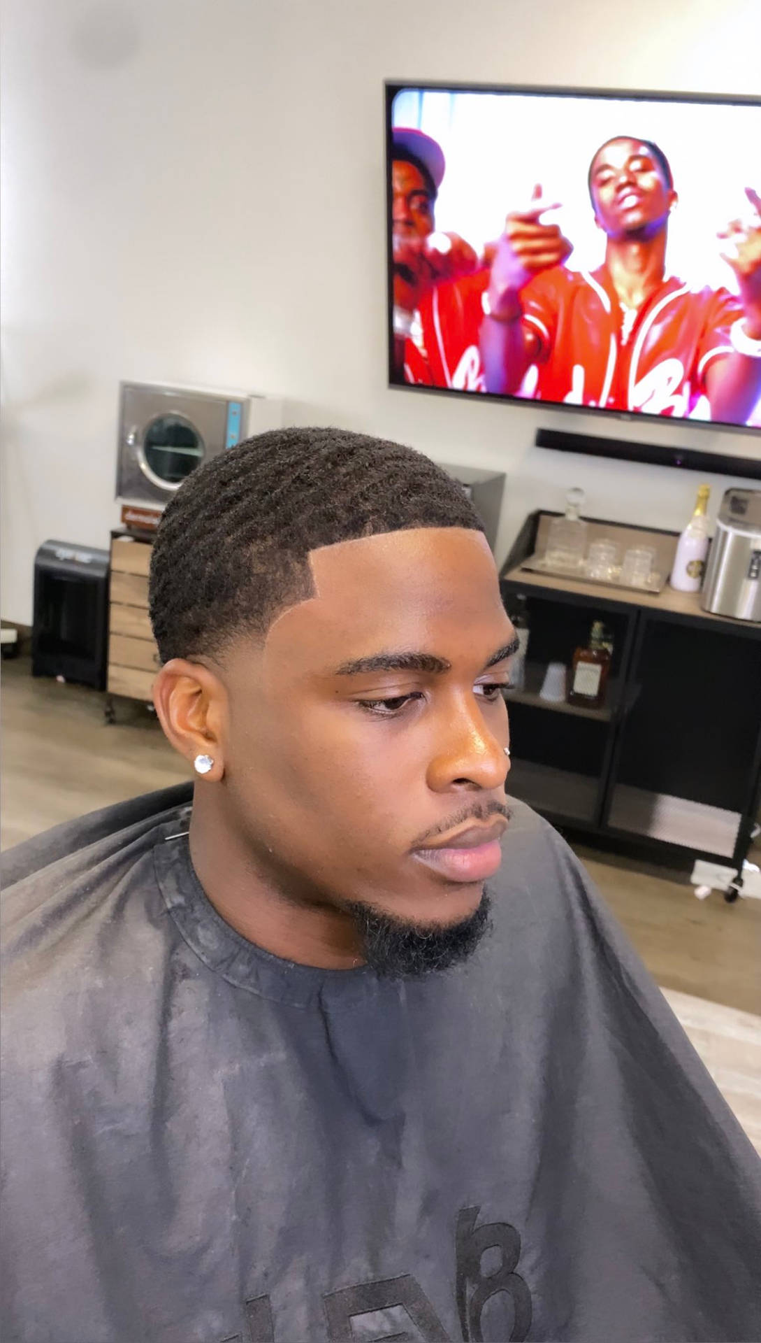 Insta-famous Swavy Lee Flaunting His Signature Hairstyle Background