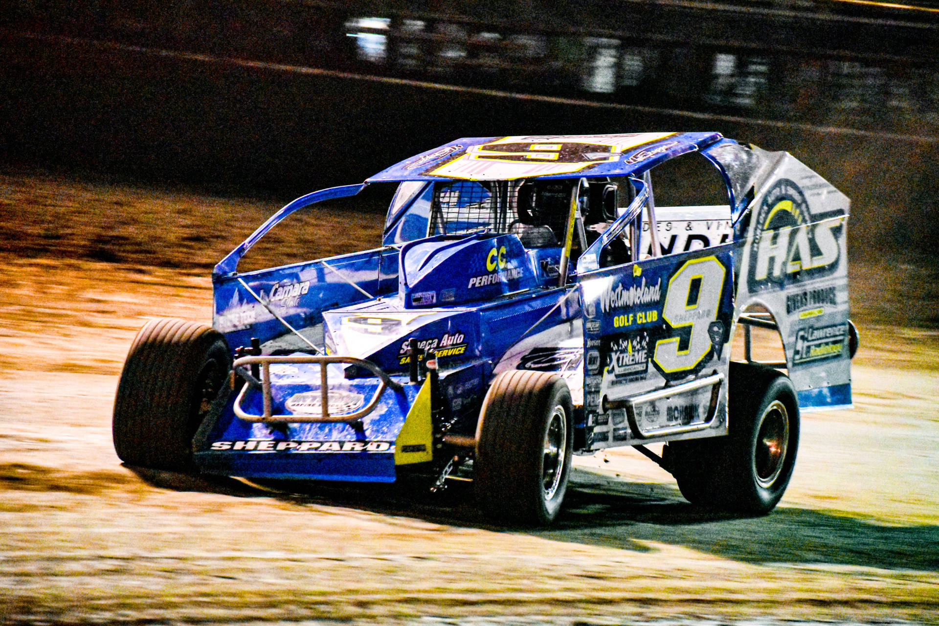 Intense Action On The Dirt Track Background