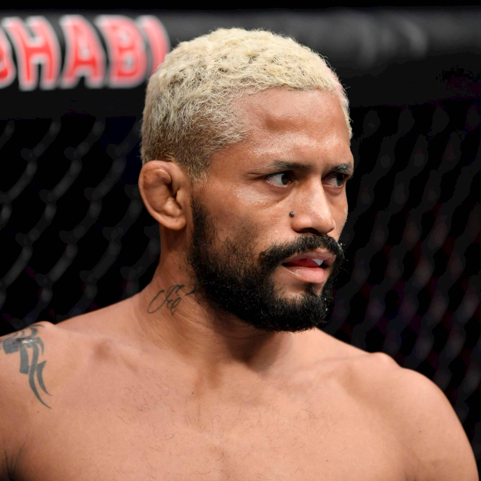 Intense Close-up Of Ufc Champion Deiveson Figueiredo Background