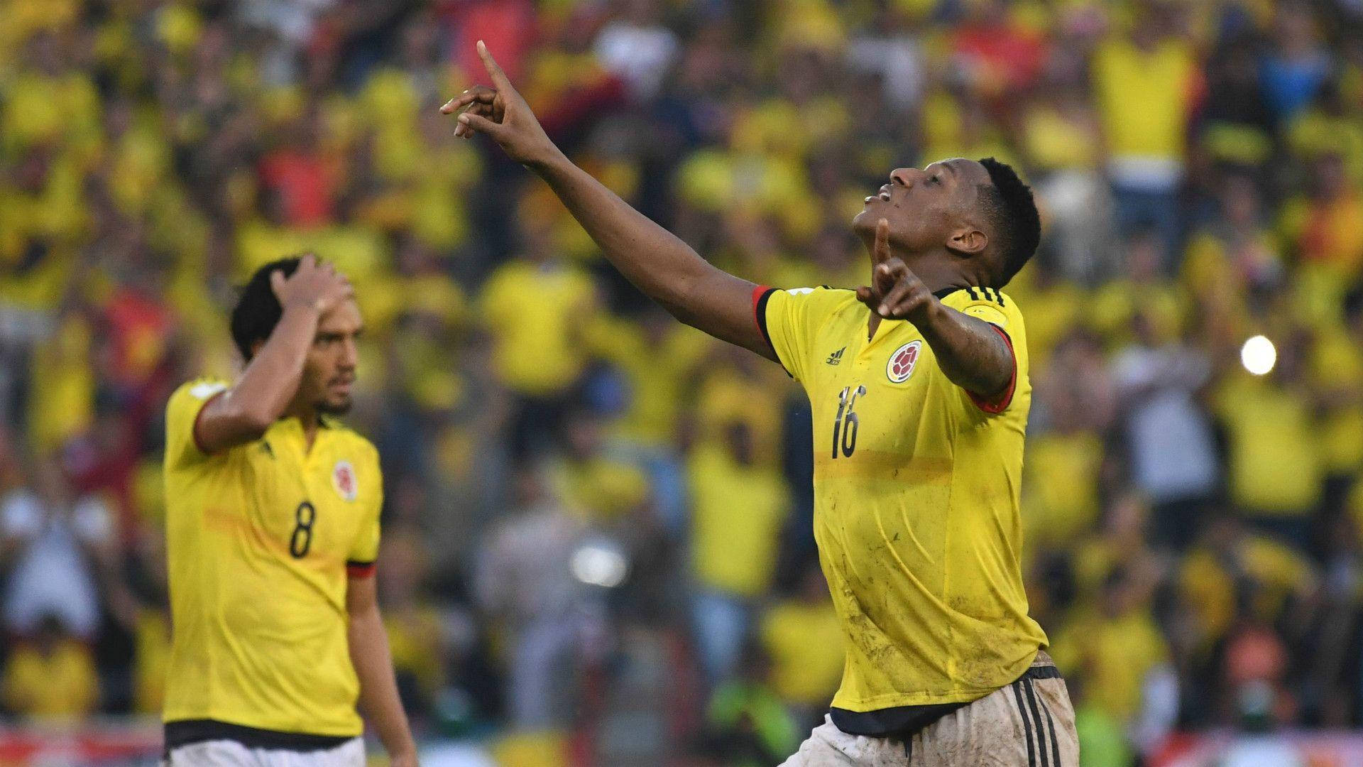 Intense Determination - Yerry Mina Gazing Skywards Background