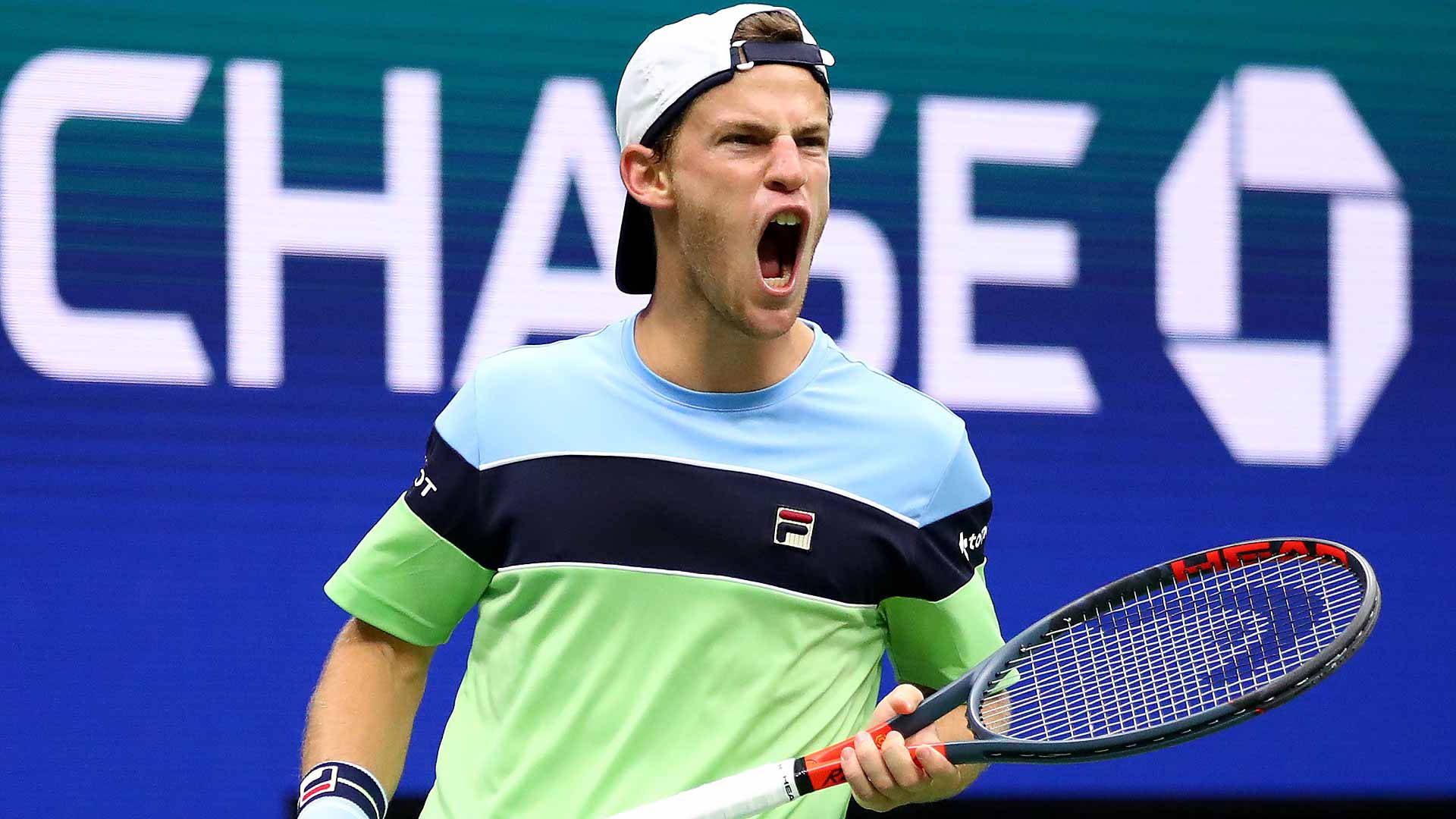 Intense Diego Schwartzman Expresses Triumph In Tennis Background