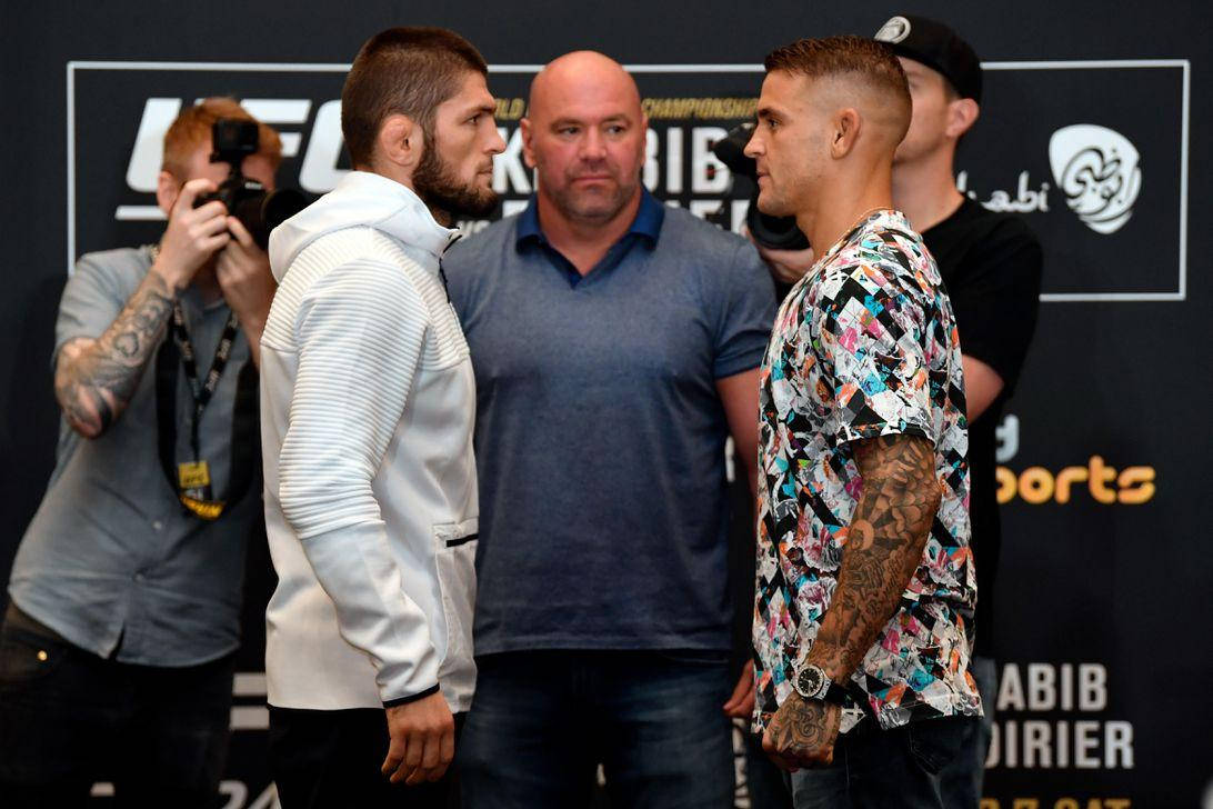 Intense Face-off Between Dustin Poirier And Khabib Nurmagomedov Background