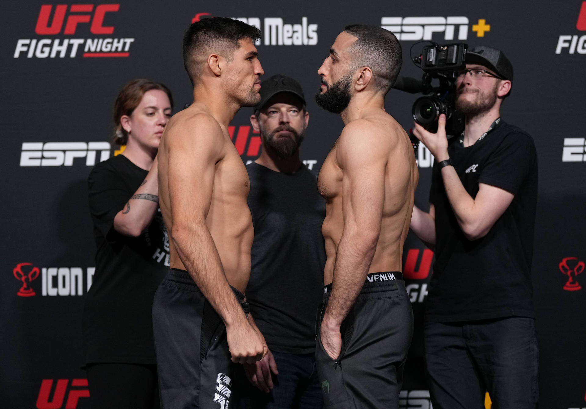 Intense Face-off Between Ufc Fighters Vicente Luque And Belal Muhammad. Background