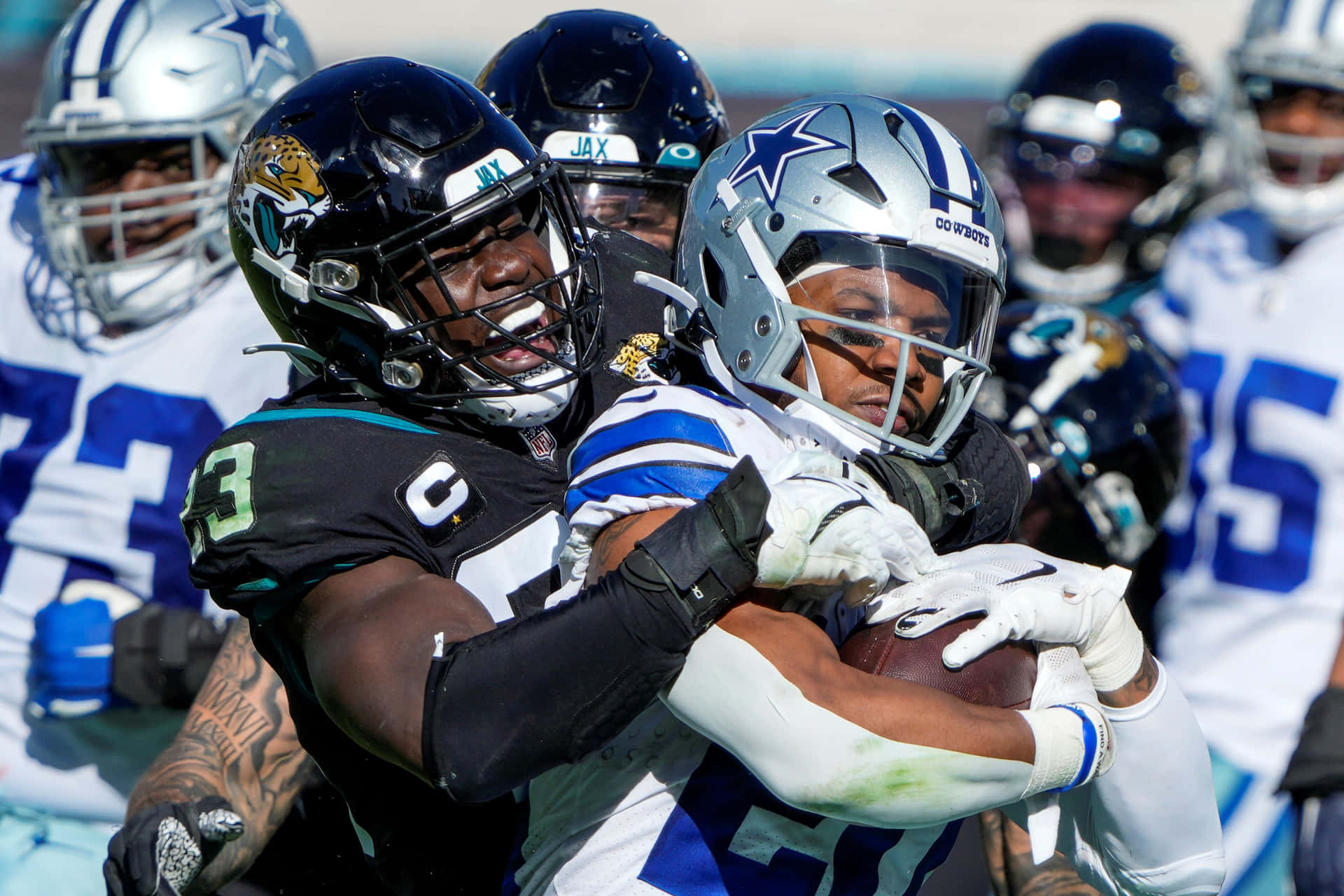 Intense Football Defense Tackle Background