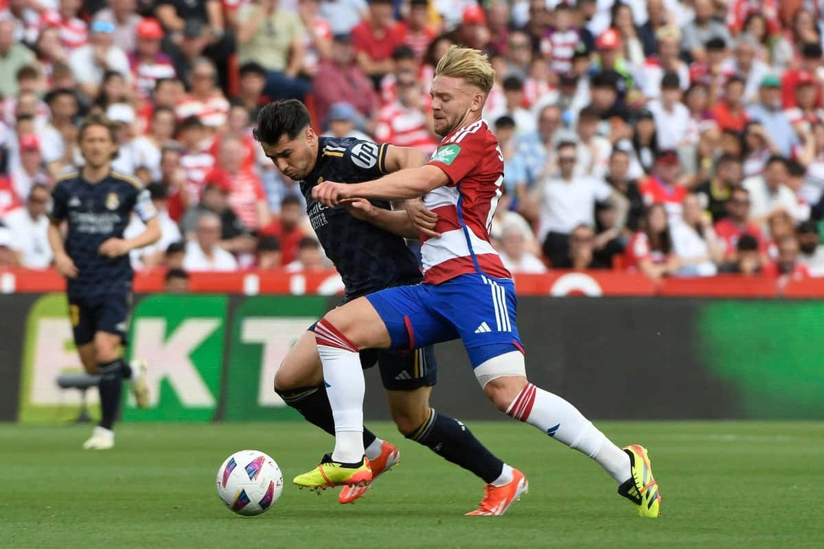 Intense Football Match Action.jpg Background