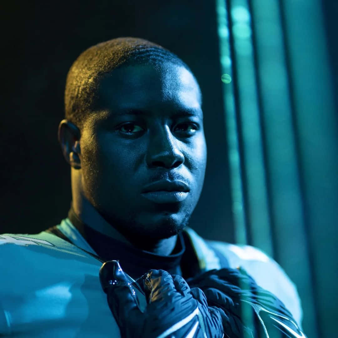 Intense_ Gaze_in_ Blue_ Lighting Background