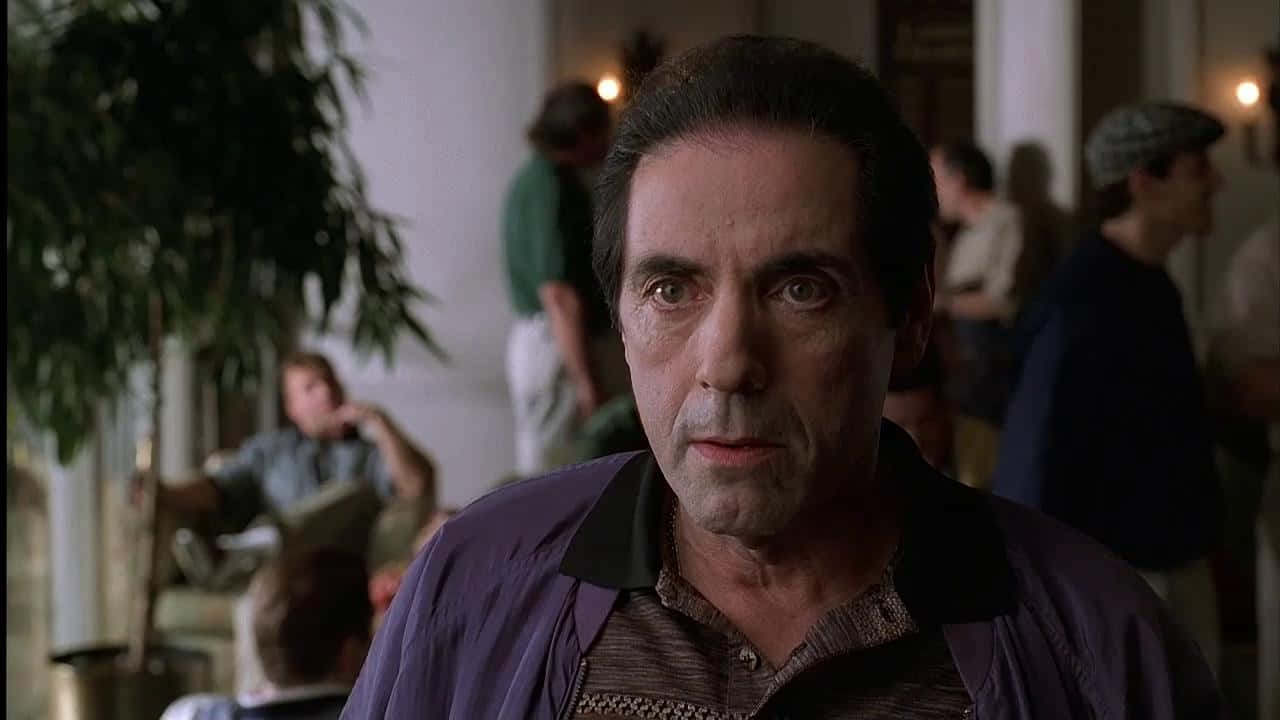 Intense Gaze Man Indoor Scene Background