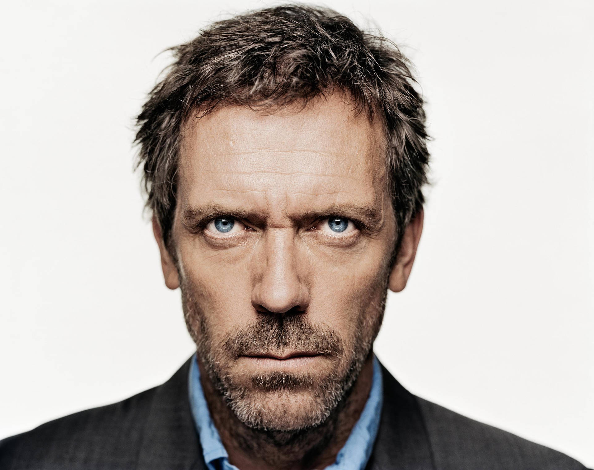 Intense Gaze Of Dr. House Md Background