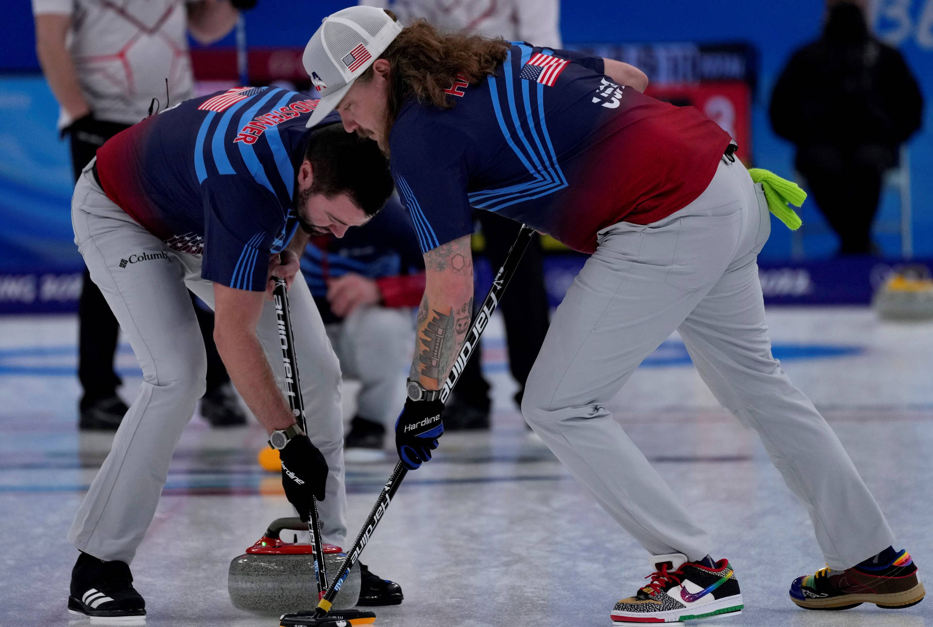 Intense Ice Brushing In Curling Background