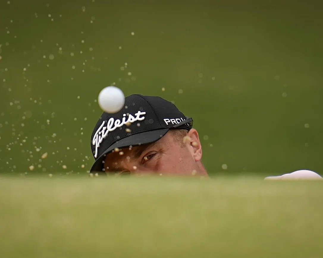 Intense Justin Thomas Golf Shot Background