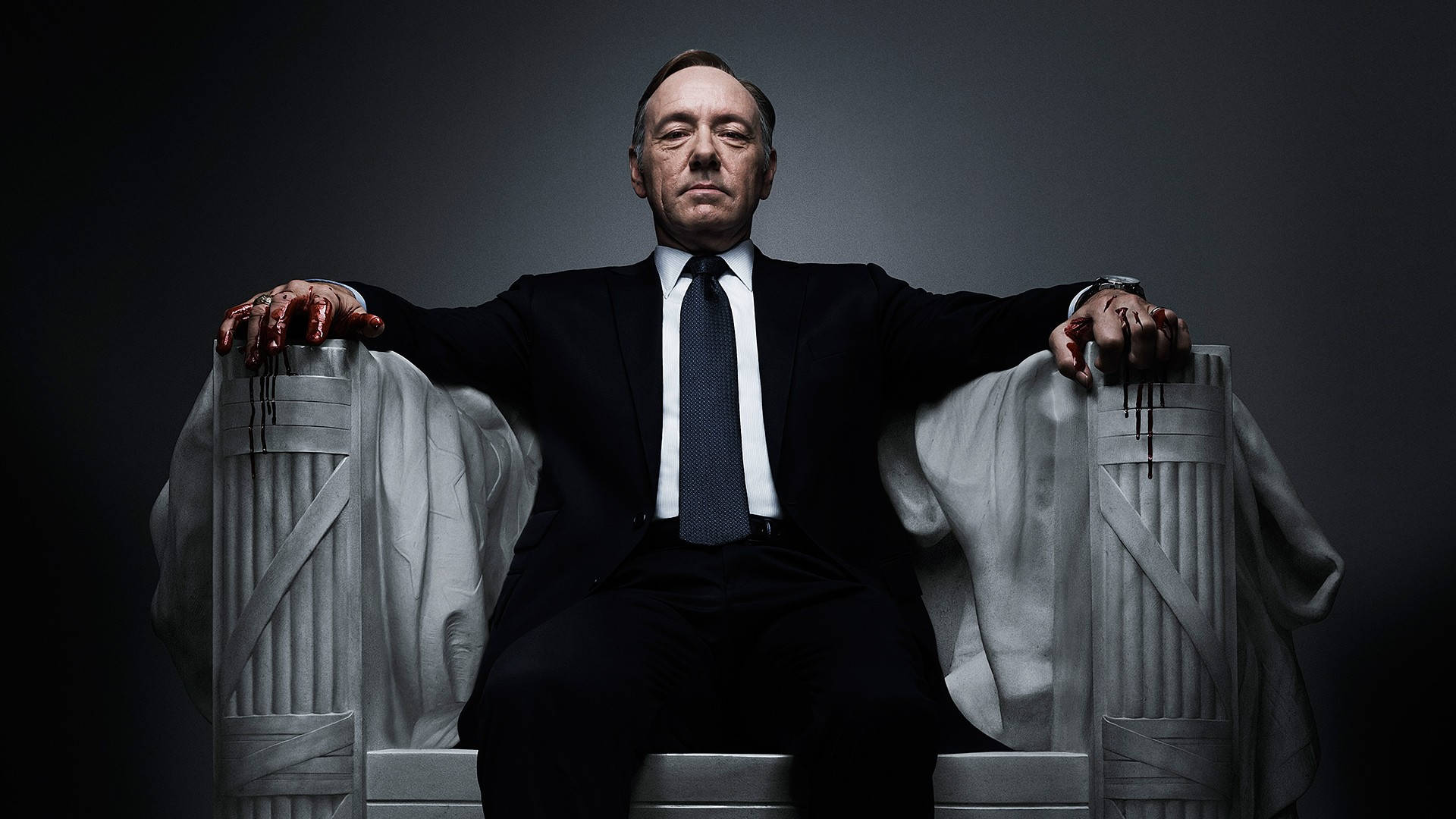 Intense Look Of Kevin Spacey As He Displays A Bloody Hand In House Of Cards Background