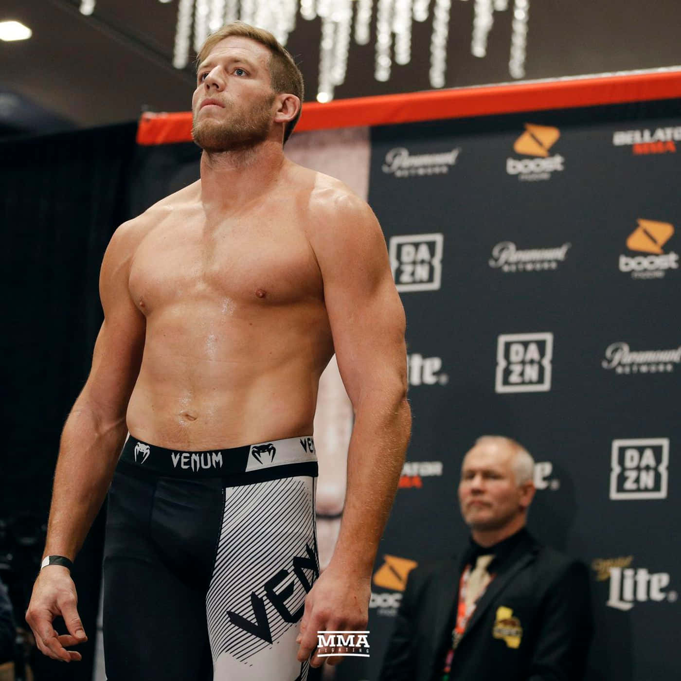 Intense Mma Fighter Jake Hager In Action Background