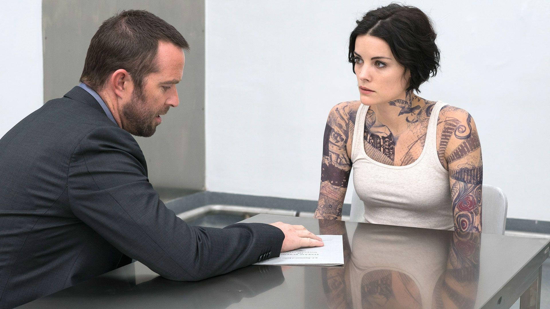 Intense Moment Between Jane Doe And Kurt Weller In Blindspot Background