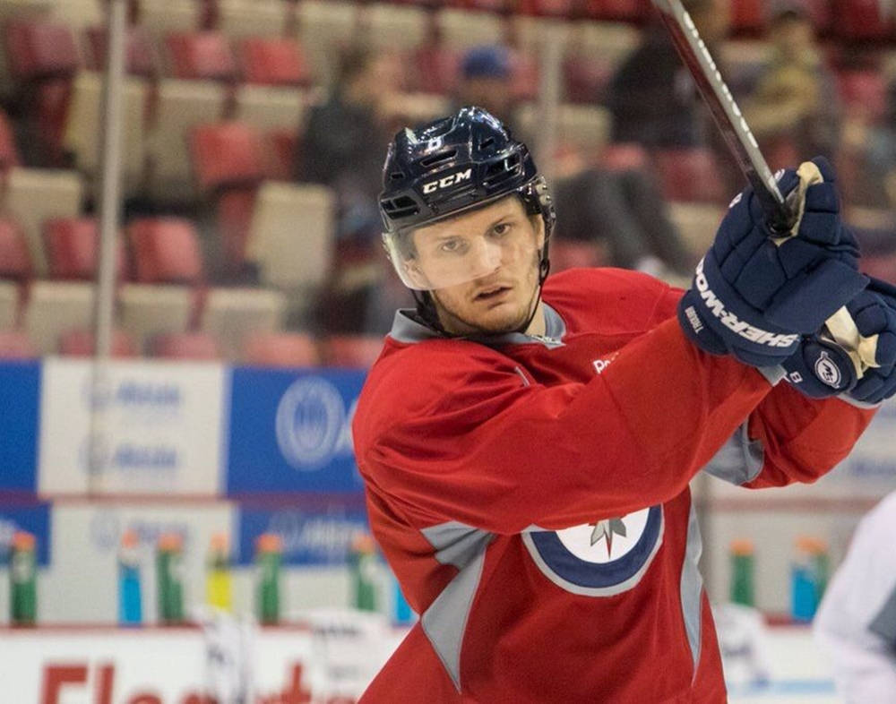 Intense Moment Of Jacob Trouba In Action Background