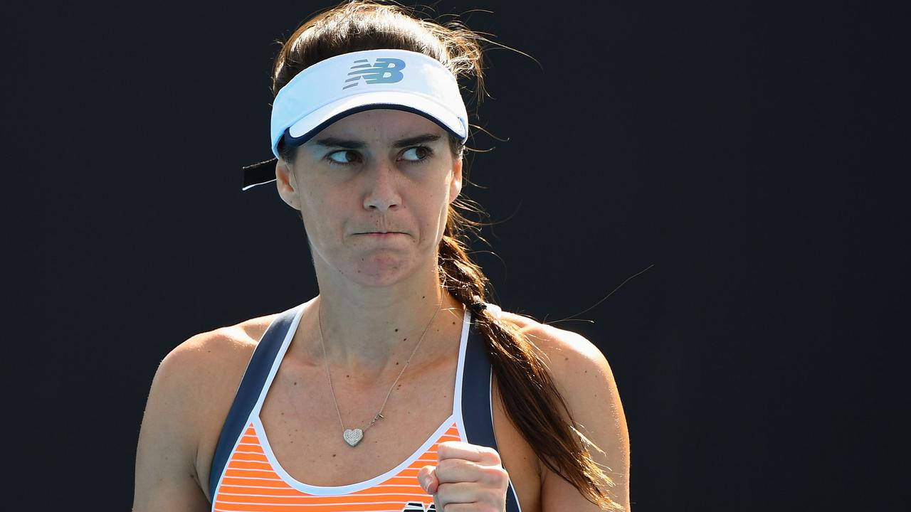 Intense Moment Of Sorana Cirstea Contemplating After A Shot In A Match. Background