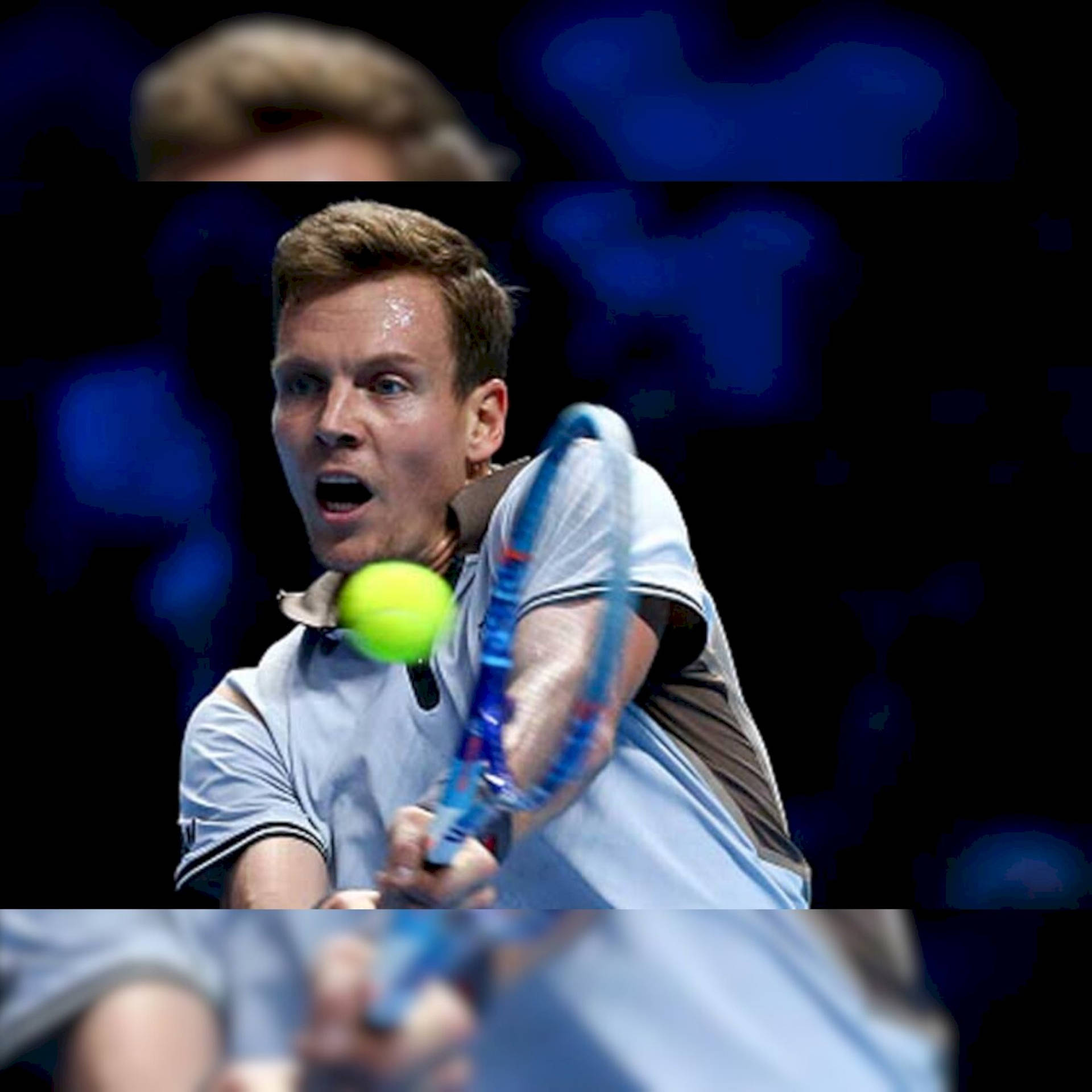 Intense Moment Of Tomas Berdych Playing Tennis