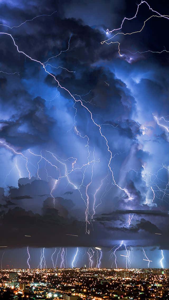 Intense Nighttime Lightning Over City.jpg Background