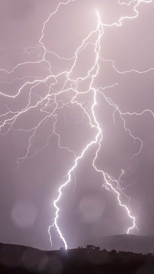 Intense Nighttime Lightning Strike Background