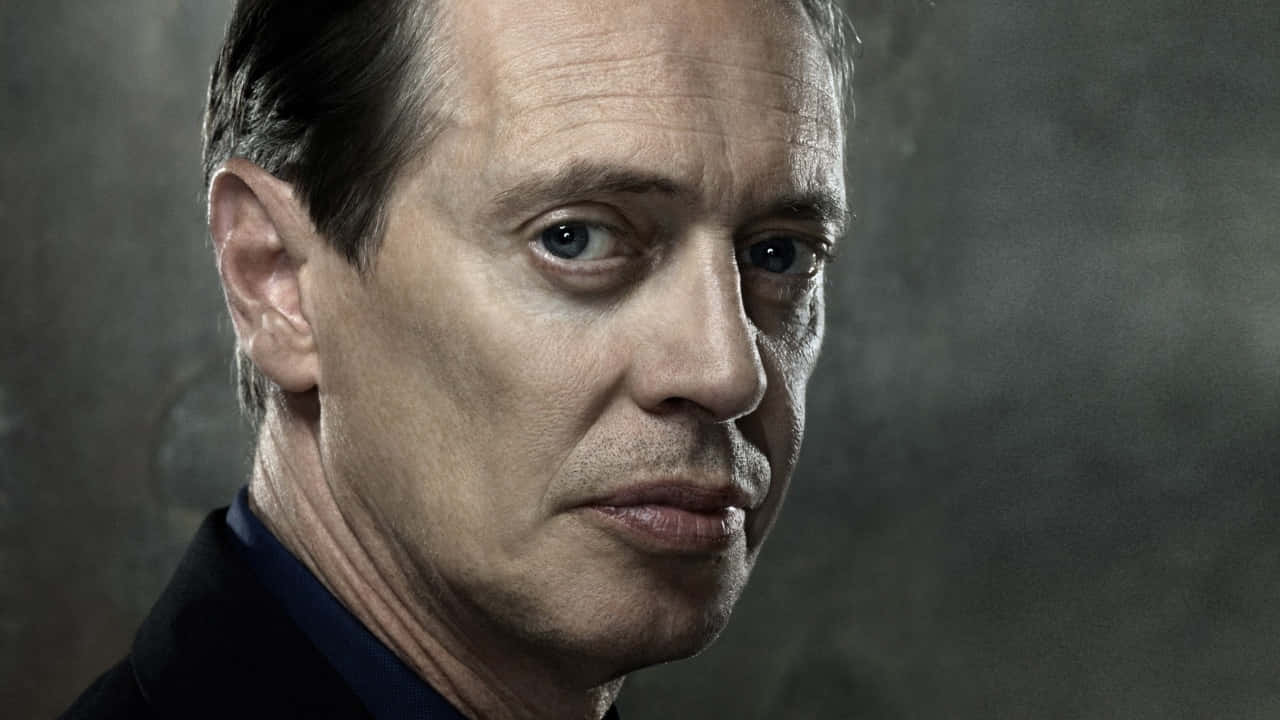 Intense Portrait Of American Actor Steve Buscemi. Background