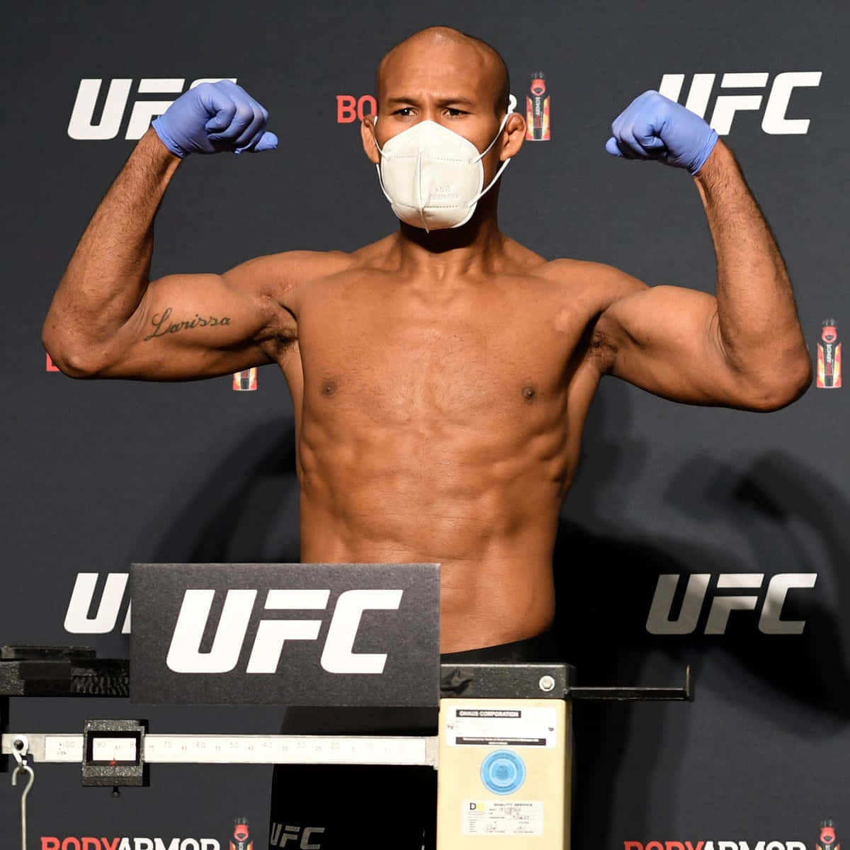 Intense Preparation - Ronaldo Souza Flexing Muscles At Weigh-in Background