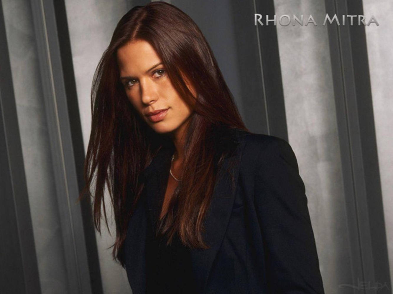 Intense Rhona Mitra - A Fierce Expression. Background