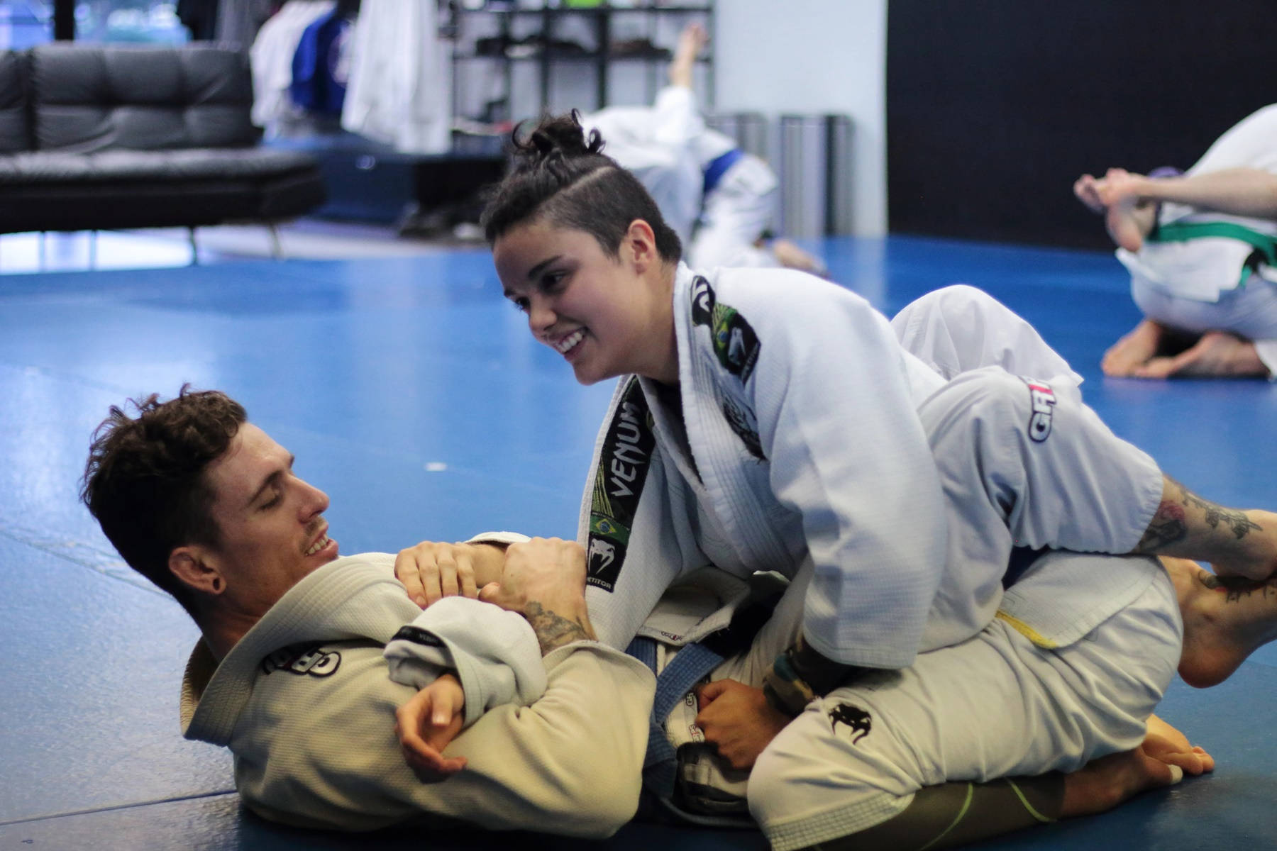 Intense Training Session In Brazilian Jiu-jitsu Background