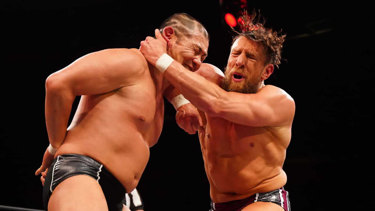 Intense Wrestling Match Elbow Strike Background