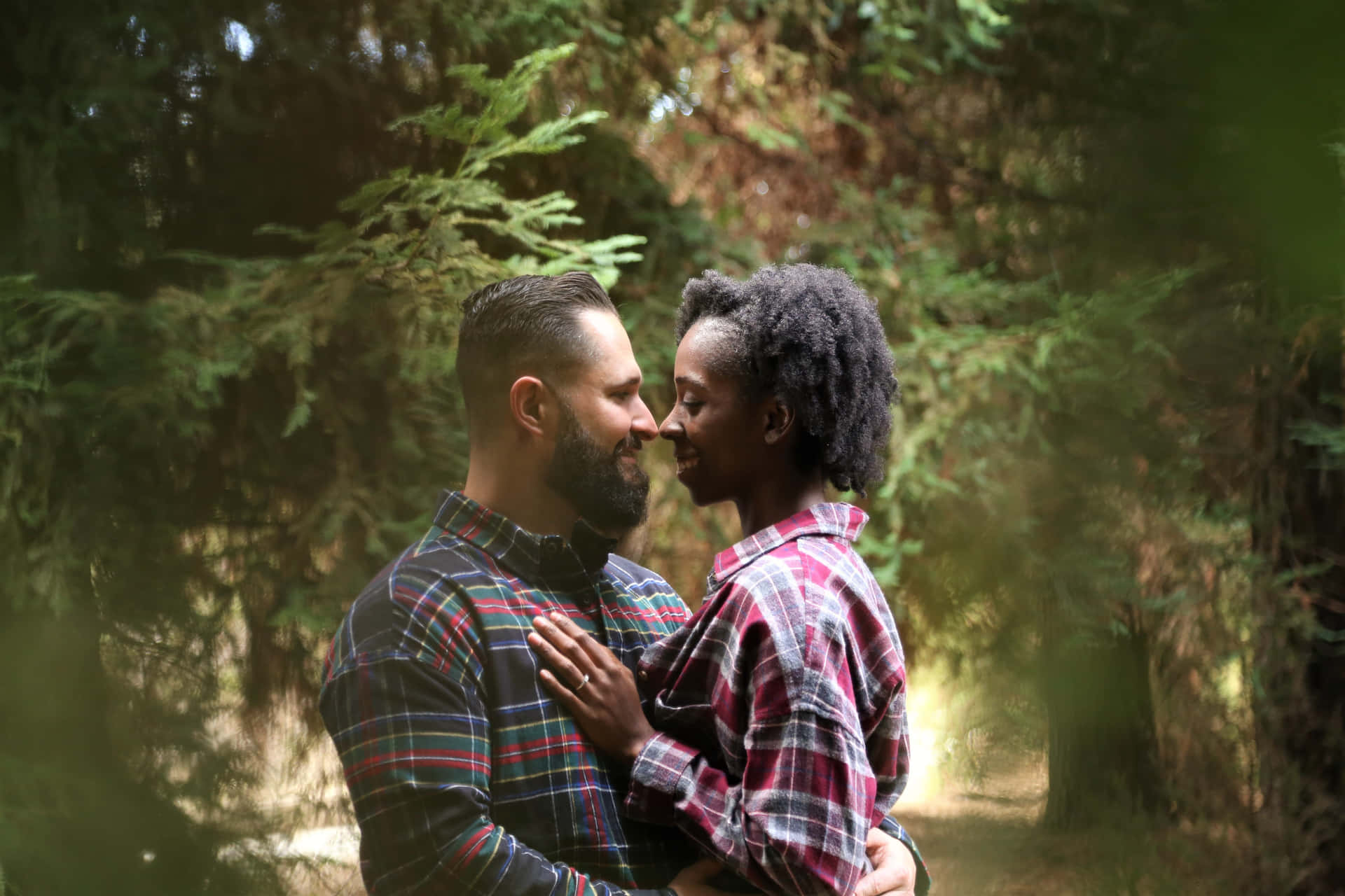 Interracial Couple Close To Each Other Background
