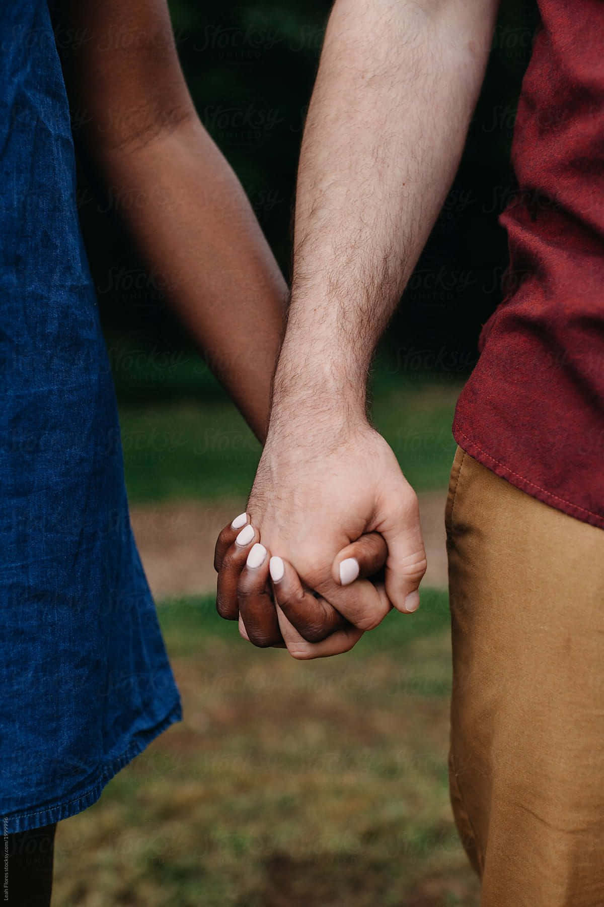Interracial Couple Holding Hands Portrait