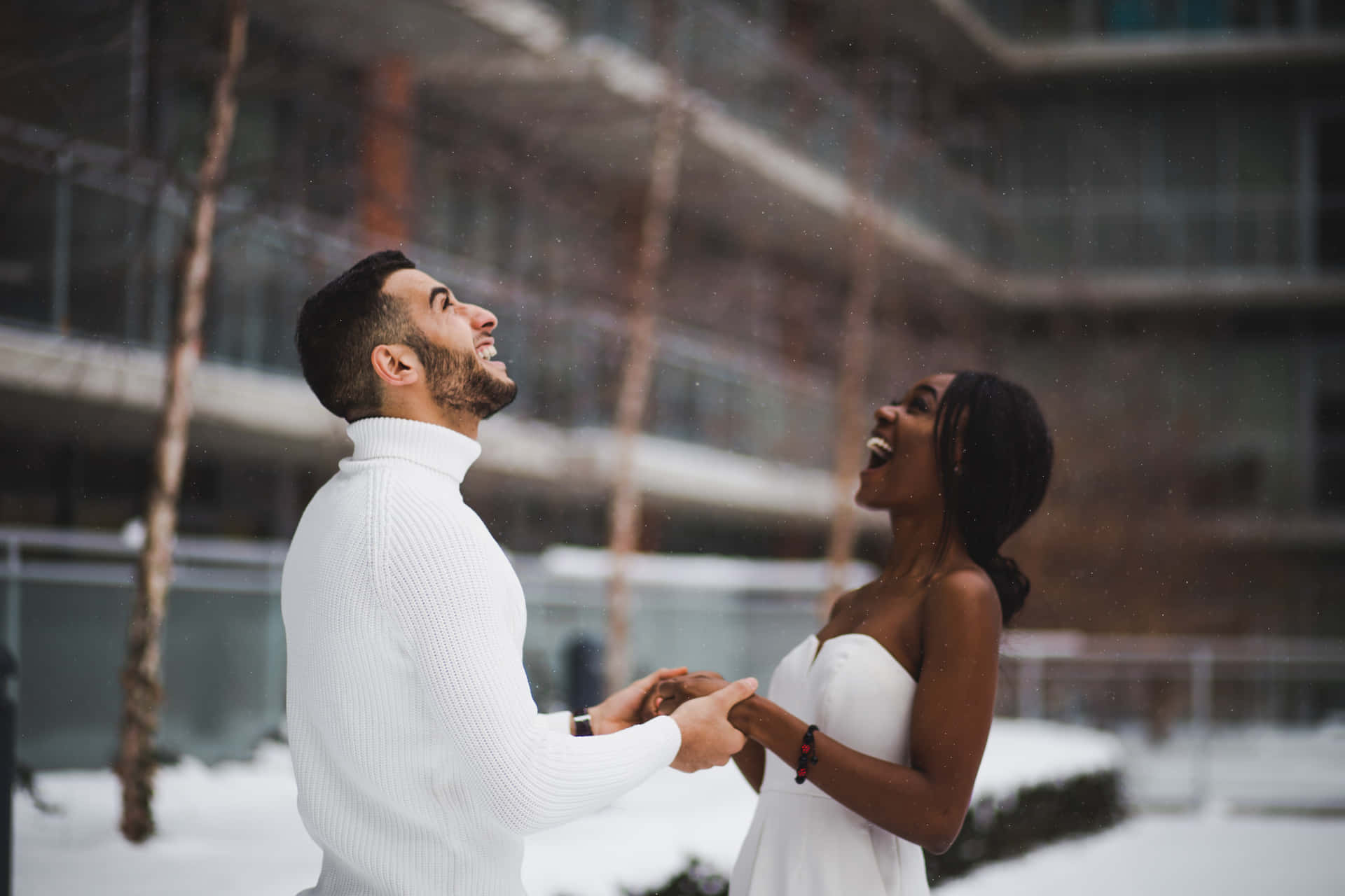 Interracial Couple Out In Snow Background